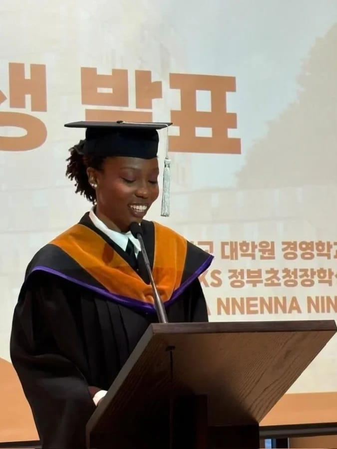 Tony Onyima proudly standing with his daughter, Nnenna, at her Master's graduation ceremony in Daejeon University, South Korea.