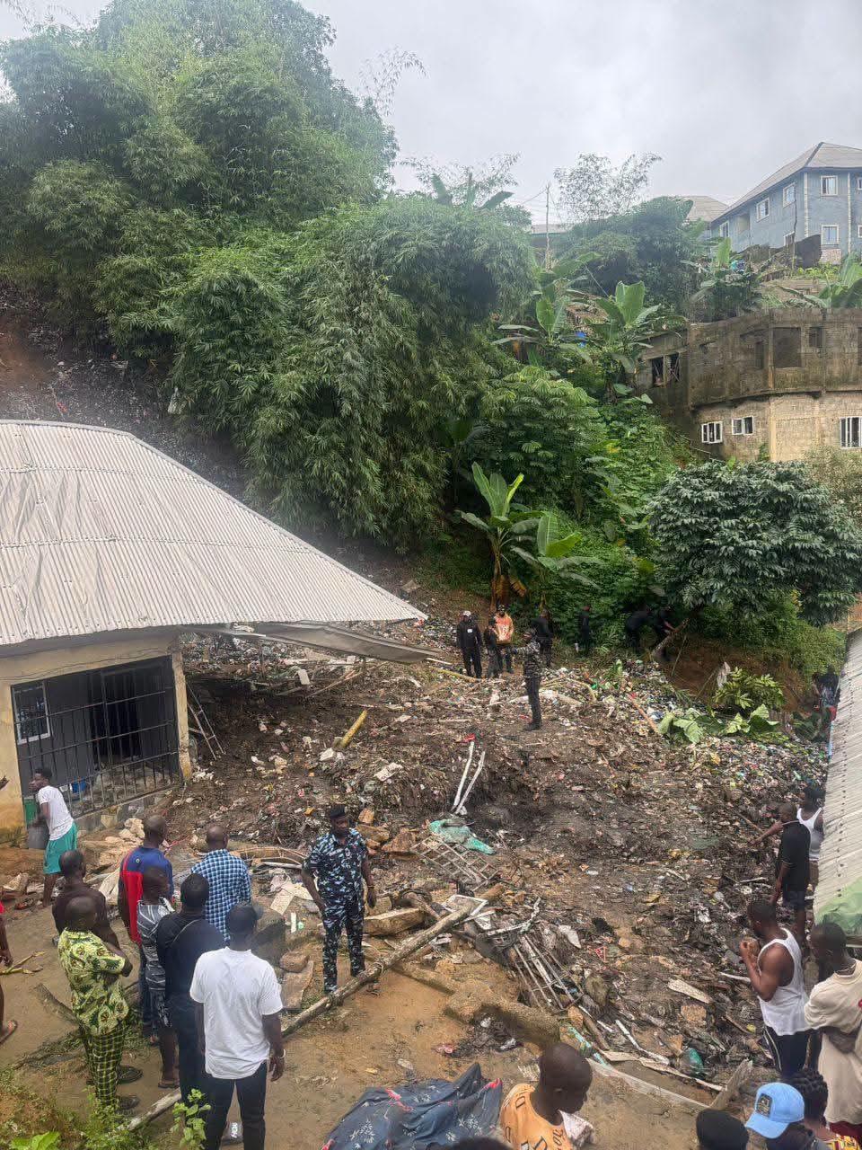 Debris and refuse at the scene where a building was impacted.