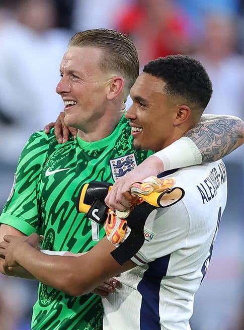 Goalkeeper Jordan Pickford alongside defender Trent Alexander-Arnold.