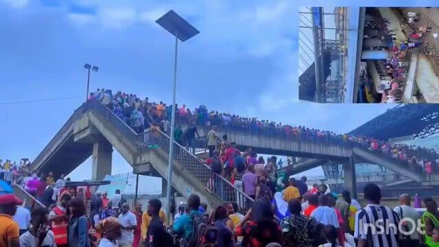 Video: Eye-witness video shows crowd on Oshodi pedestrian brigde today following the morning downpour.