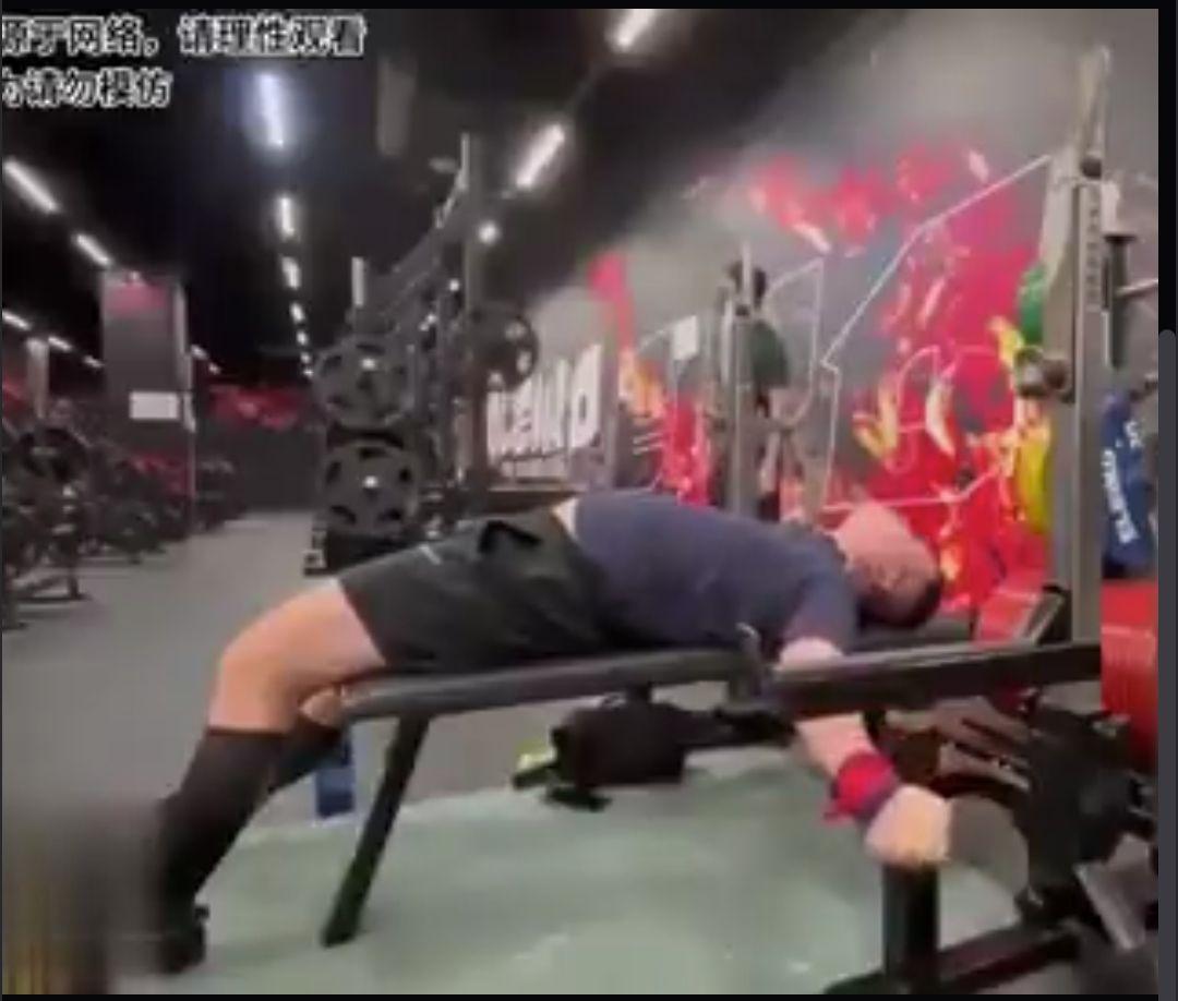 A man became trapped after a heavy weight fell onto his neck during a lift
