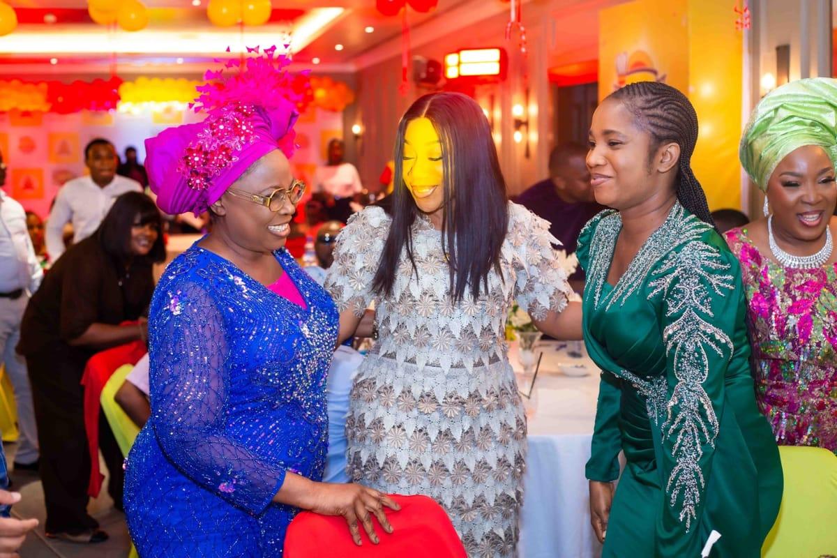 One of the 20 millionaires posing with their ₦1 million cheque alongside Royal Salt Ltd representatives and guests.