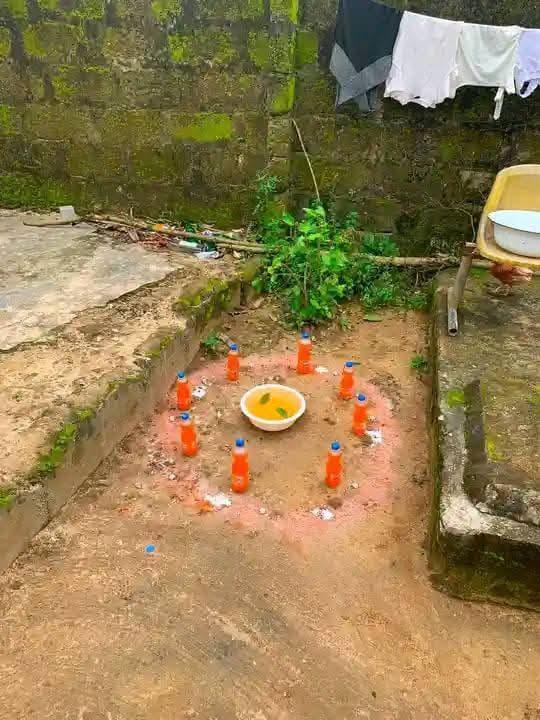 Youths inspecting the remnants of a destroyed shrine in Eleme LGA.