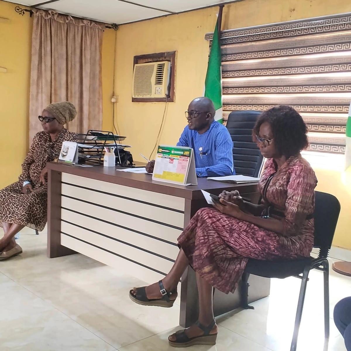 Osun NYSC State Coordinator, Mr. Ekeng Ita Kubiangha, with Adewebi Opeoluwa and other officials.