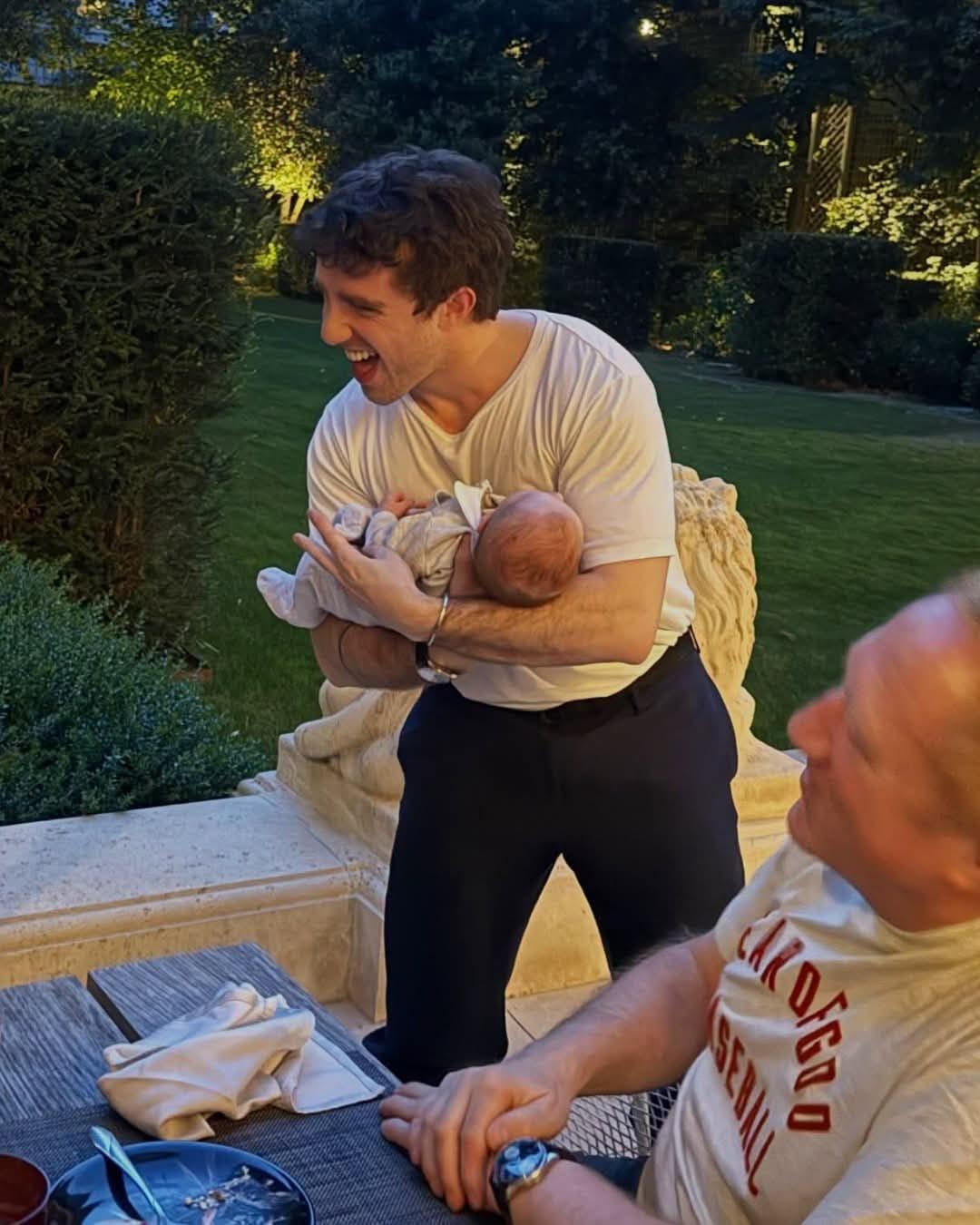 Lara and François Jr. with their baby boy