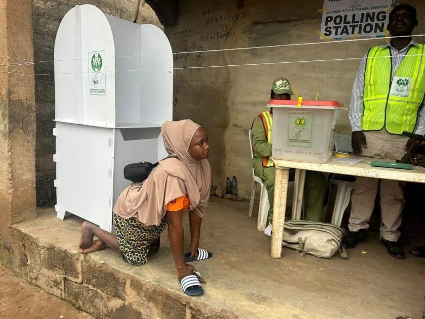 Aminat Akinsola, a physically-challenged voter, at the polling unit in Ejigbo, Osun State.