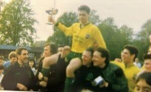 A dynamic shot from a football match, possibly featuring Mark Burke or his teams.