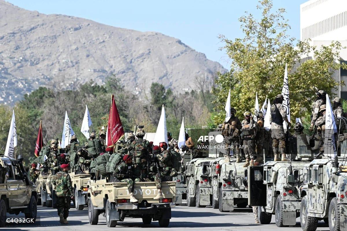A convoy of Taliban security personnel is parked near the former US Embassy in Kabul on August 15, 2026