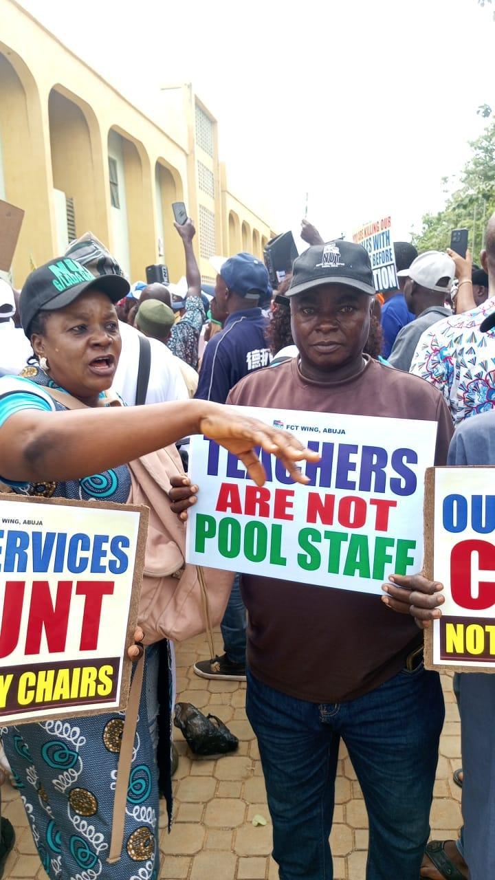 Abuja teachers gather at the Open University to protest prolonged delays in their career progression.