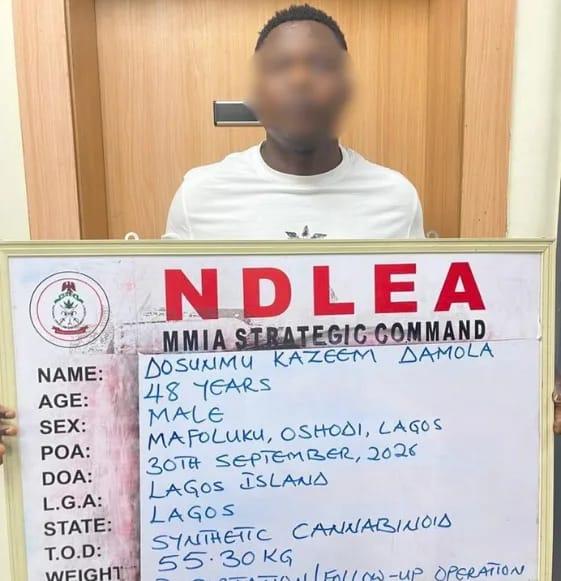 NDLEA operatives arresting a suspect during a drug operation.