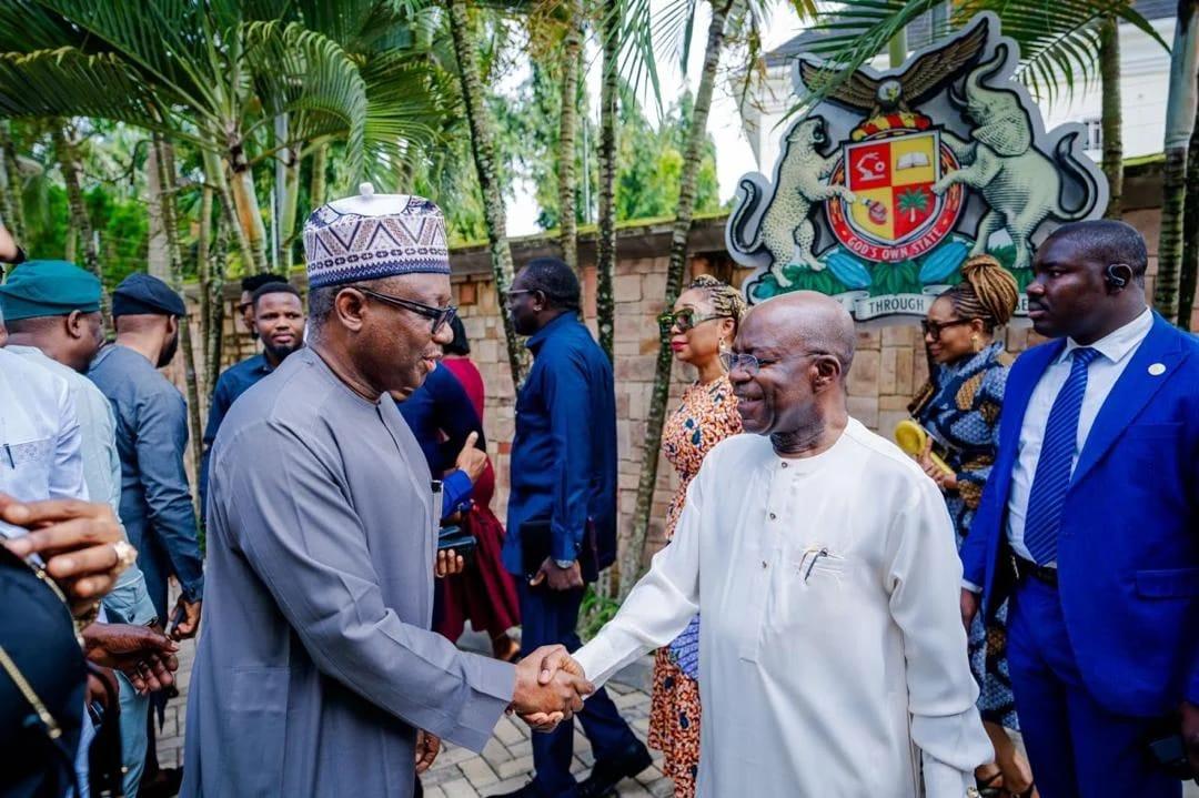 Abia State Governor Alex Otti (left) shaking hands with RMAFC Chairman Dr. Muhammed Shehu during the courtesy visit at the Government House.