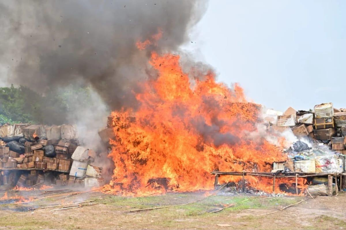 Flames consume seized narcotics and psychotropic substances during the court-ordered destruction exercise in Lagos.