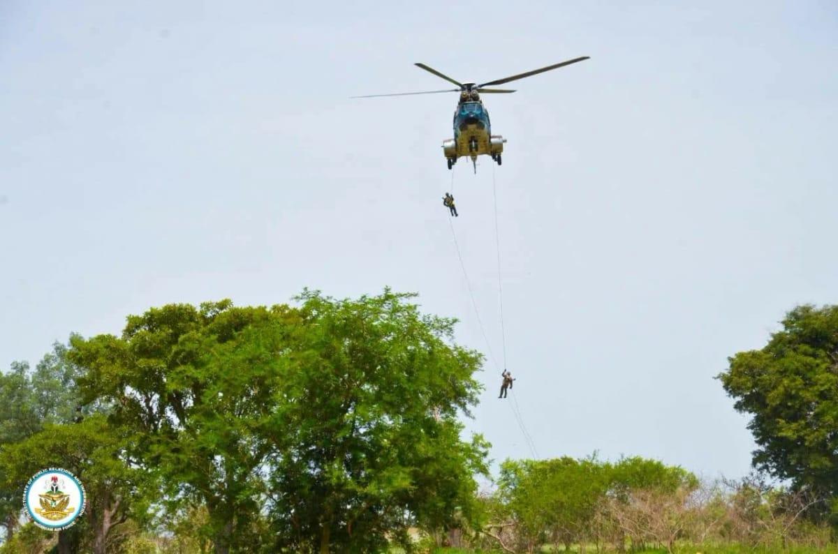 Special forces operatives showcasing their skills during the graduation ceremony.