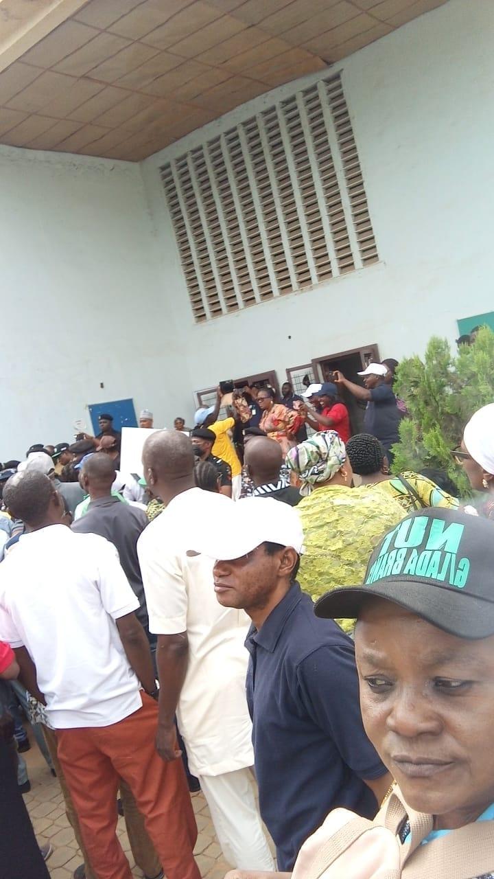Aggrieved FCT teachers holding placards to demand immediate promotions and an end to career stagnation.