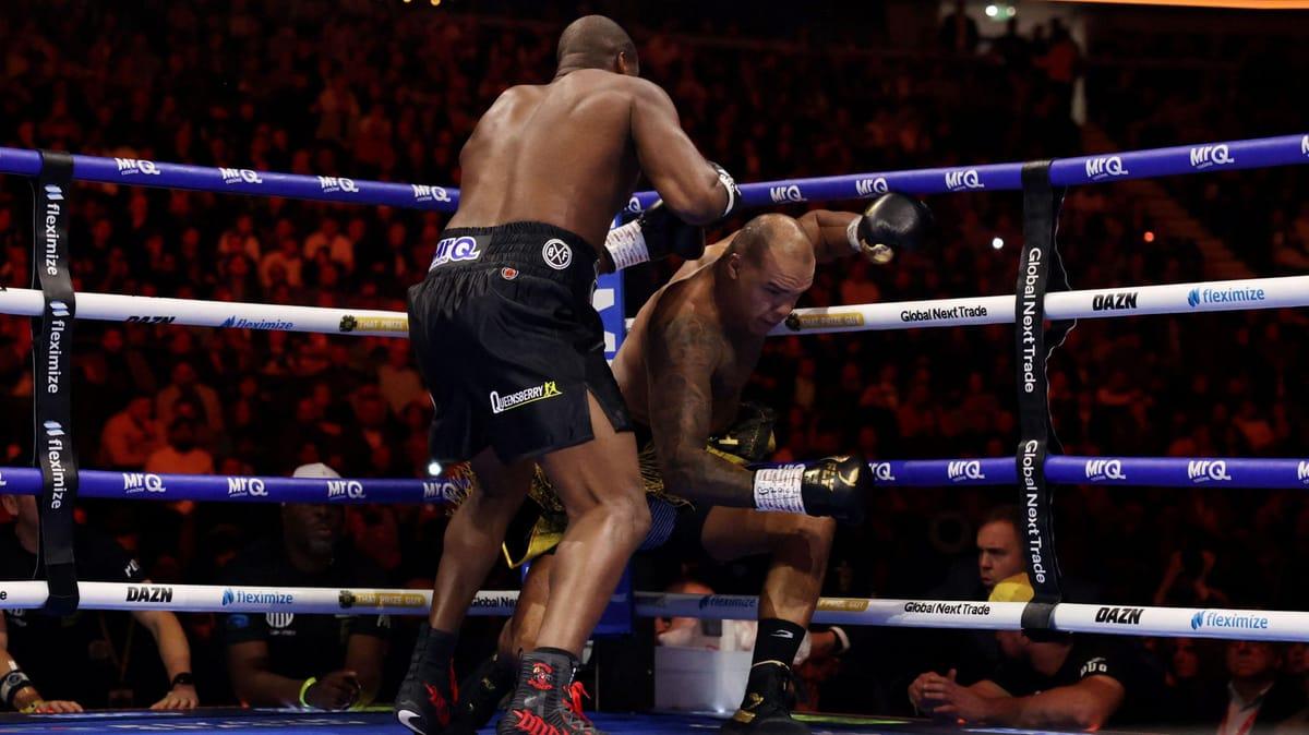 Daniel Dubois cornering Fabio Wardley against the ropes, unleashing a flurry of punches.