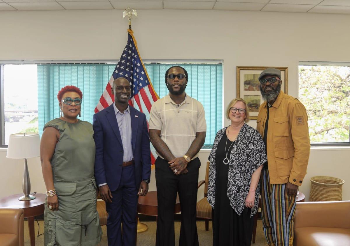 Burna Boy and U.S. Consul General Brandon Hudspeth during their meeting aimed at boosting creative economy collaboration.
