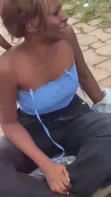 A female student, reportedly the accuser, seen distressed after the incident.
