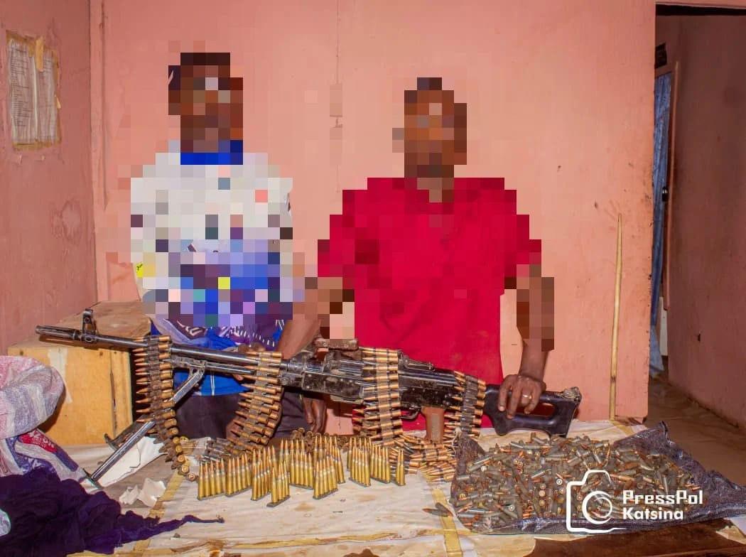 Exhibits recovered from the suspects, including firearms and ammunition.
