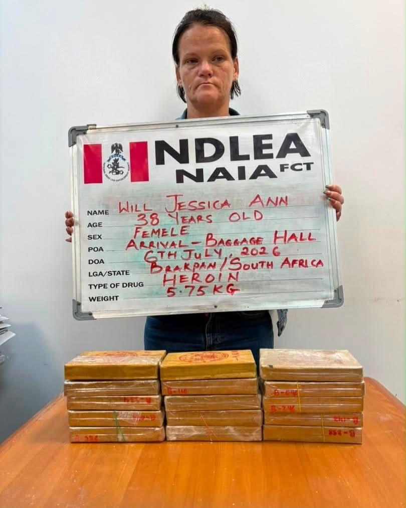 NDLEA officials presenting the recovered 5.75kg of heroin at Nnamdi Azikiwe International Airport.