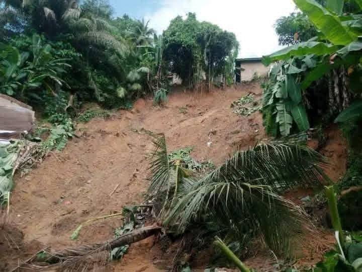 Distraught residents at the landslide site in Ikot Awatim.