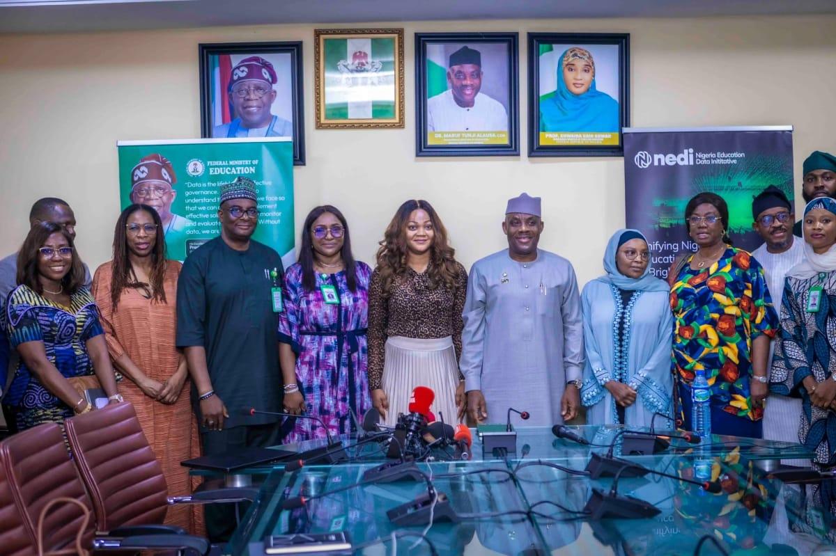 UBEC Executive Secretary Aisha Garba (centre) pictured with Education Minister Dr. Maruf Tunji Alausa (left) and NIMC Director-General Engr. Abisoye Coker-Odusote (right) during a strategic meeting.