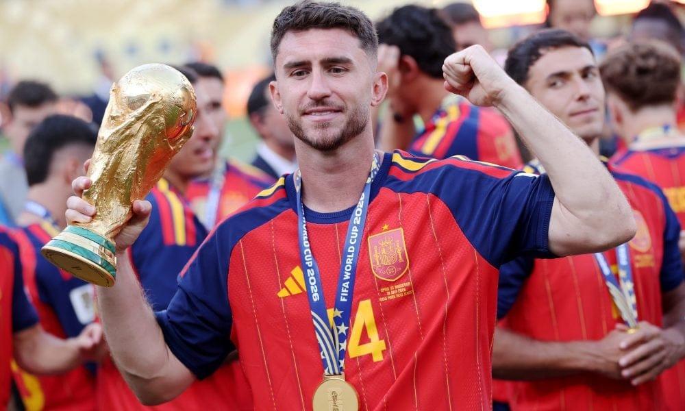 Pau Cubarsi and Aymeric Laporte celebrate Spain's World Cup win