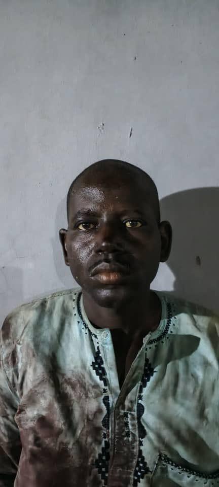 A Nigerian soldier stands guard, representing the ongoing efforts of Operation HADIN KAI against insurgency.