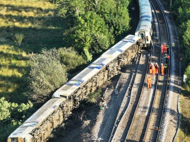 Emergency services responding to the scene of the derailment