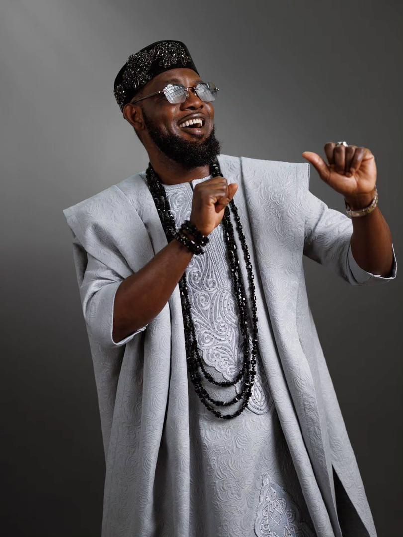 A stylish portrait of AY Makun celebrating his 55th birthday.