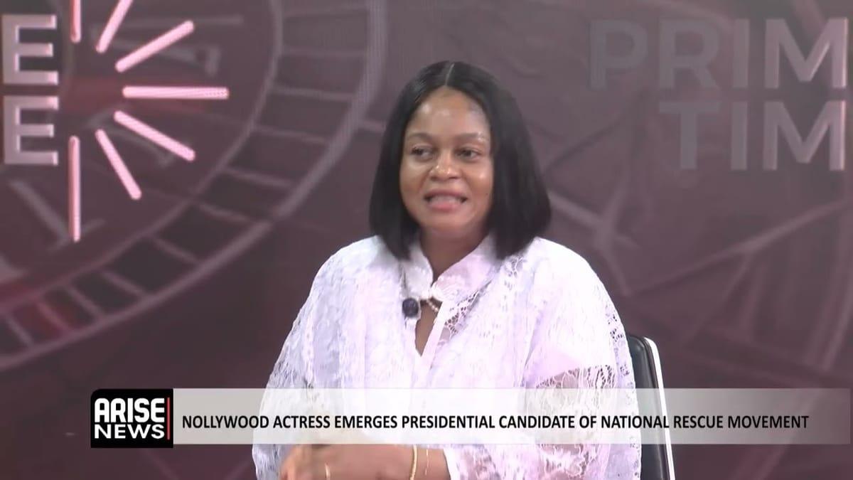 A YouTube player thumbnail featuring an interview with presidential candidate Esther Okereke.