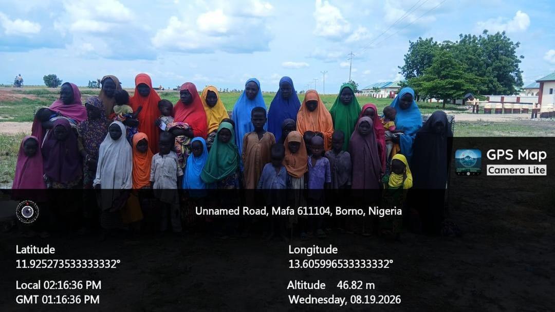 Nigerian Army personnel receive and begin profiling a group of women and children who fled a terrorist enclave in Borno.