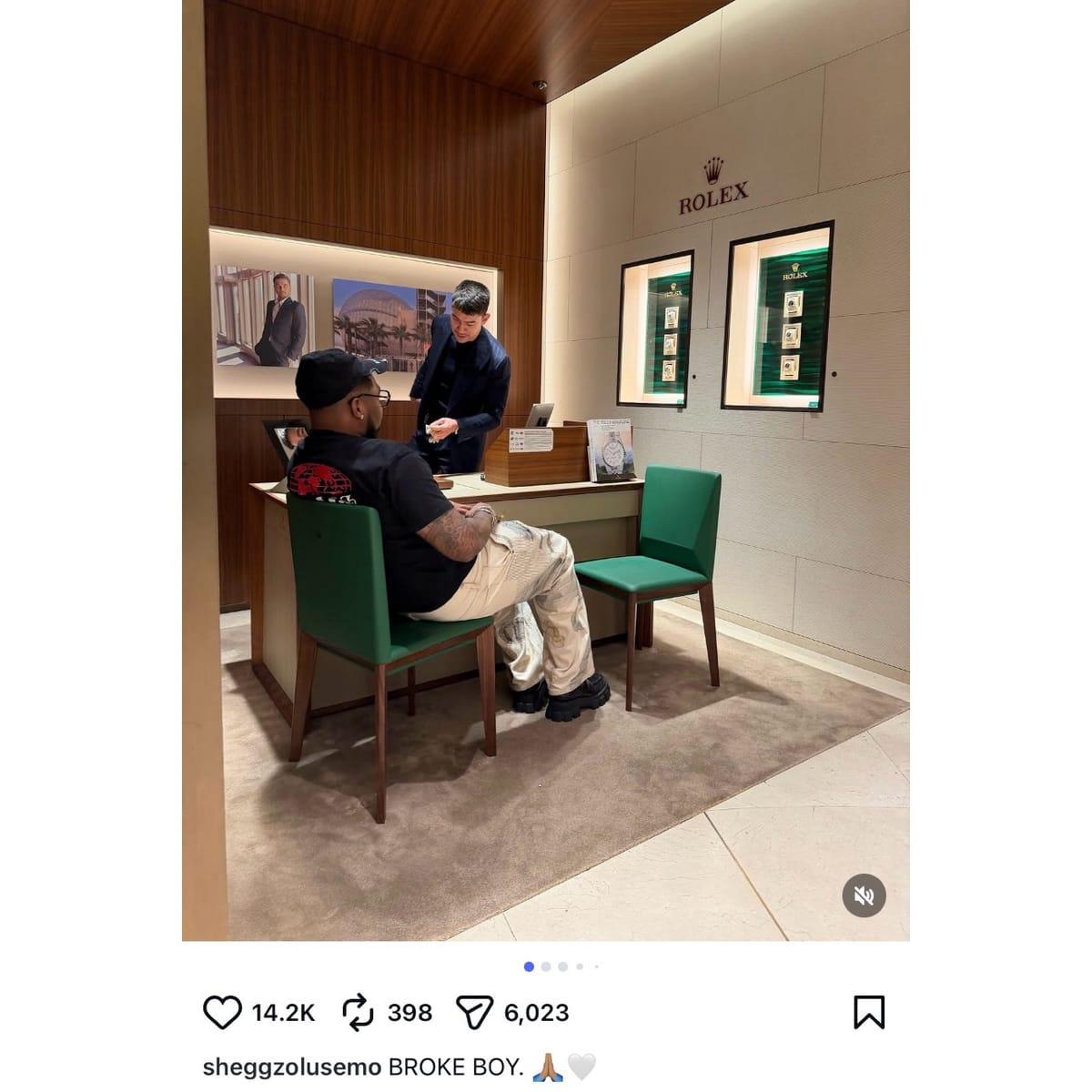 Sheggz showcasing a high-end Rolex wristwatch, a key item in his social media posts.