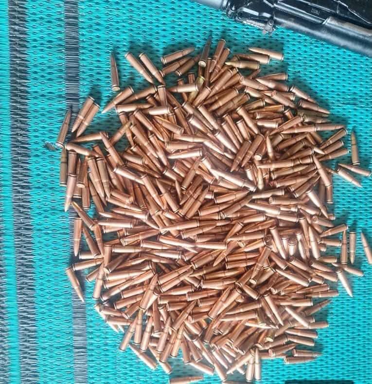 Destroyed terrorist camp logistics, including motorcycles and fuel, after a military raid in Adamawa.
