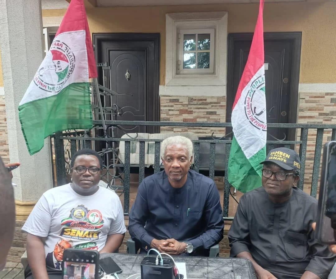 Prince Samben Nwosu, the PDP senatorial candidate for Anambra South, engaging with party members and journalists during a recent interactive session at his Nnewi residence.