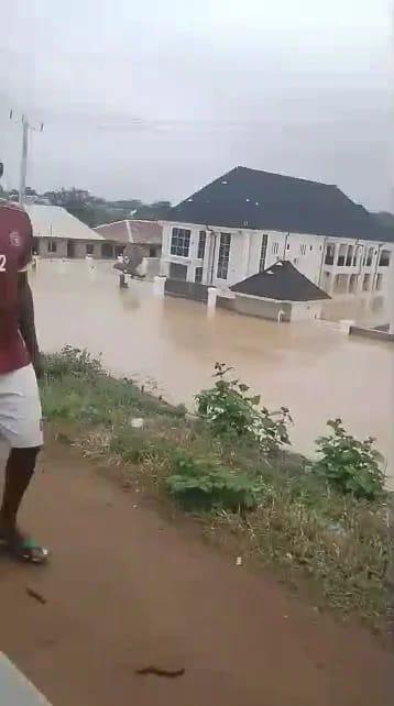 A street in Ijetu Area, Osogbo, completely submerged by floodwaters, illustrating the devastating impact on local residents.