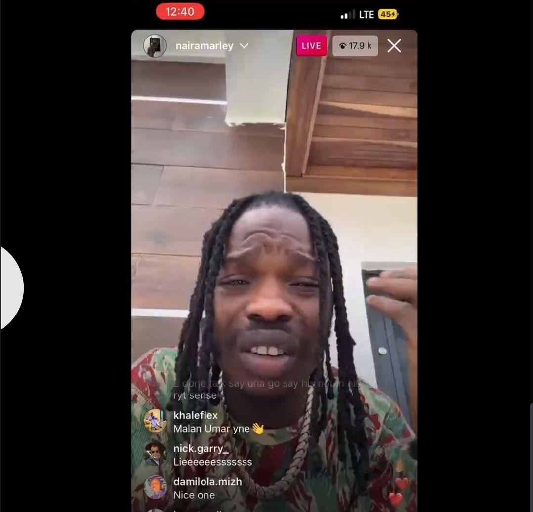 Naira Marley crying and also addressed Sam Larry’s accident.